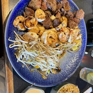 This is The Ninja with fried rice. Filet mignonette, chicken and shrimp.