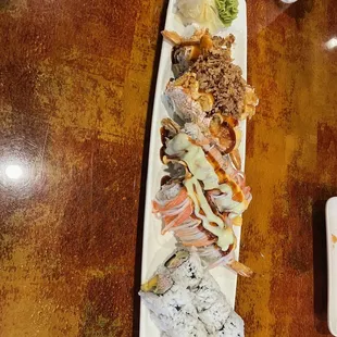 Mango cali roll on bottom middle is Fort Worth top is Cajun