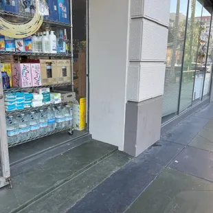 a storefront with a window full of products