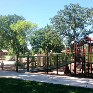 Two playgrounds - one in the foreground (right) and one in the background (left).