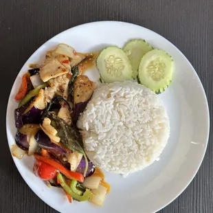 a plate of rice and vegetables