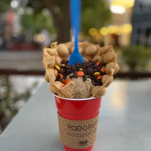 Cappuccino gelato with chocolate chips, m&amp;m, and a vanilla waffle cone.