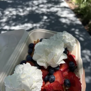 Red white and blue. Have to eat it nearby because there's too much goodies to close the lid