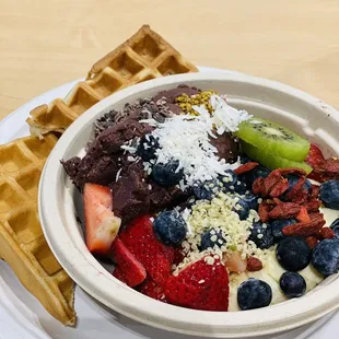 Açaí bowl with tons of fresh fruits and DIY toppings, and tasty waffles!