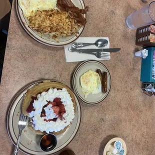 Combo number one with strawberries and whipped cream and a combo number four with peanut butter and chocolate chips.