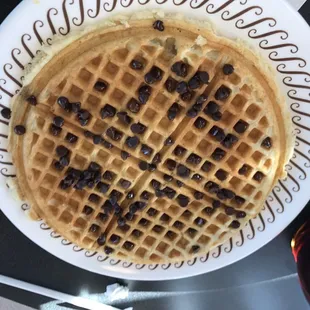 a waffle with chocolate chips on it