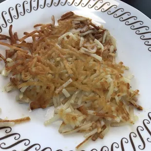hash browns on a white plate