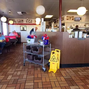 Hostess area in the middle and seating on the left.