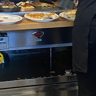 Food is barely cooked and they throw food under the stove
