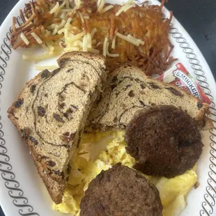 Hash-browns, Scrambled Eggs, Sausage, Raisin Bread
