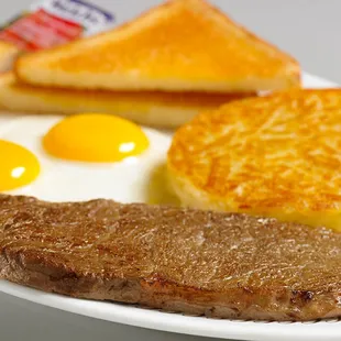 steak, eggs, toast, and toast