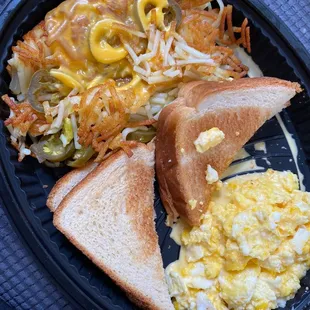 2 egg breakfast with toast and hash browns smothered/covered/peppered. Yum!