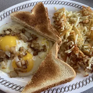 Eggs with onions, hash browns, toast