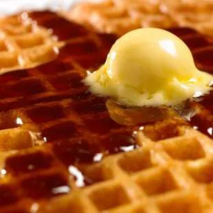 a waffle with butter on top