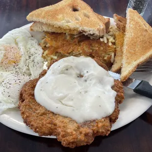 Country fried steak. Asked for hash browns instead of their classic home fries. Eggs over-easy. With white bread toast.