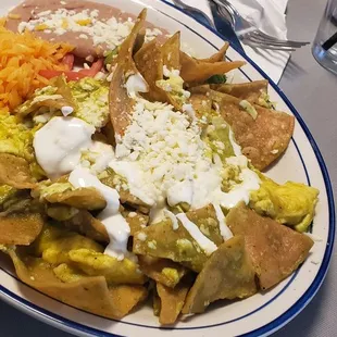 Green chilaquiles with scrambled eggs