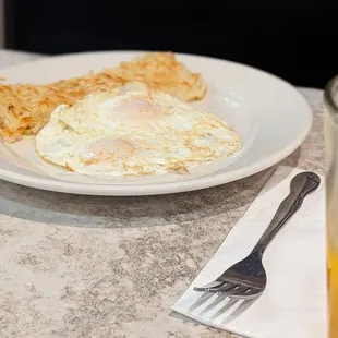 Side of eggs and hash browns.