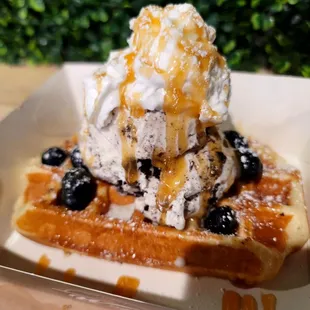 Waffle with cookies and cream ice cream, caramel drizzle, and blueberry.. two thumbs way way way up wholly molly on 1/22/23