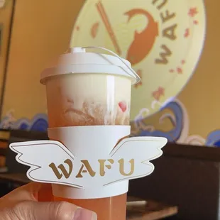 Peach iced tea with cheese foam