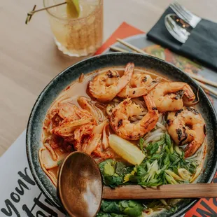 a bowl of ramen with shrimp