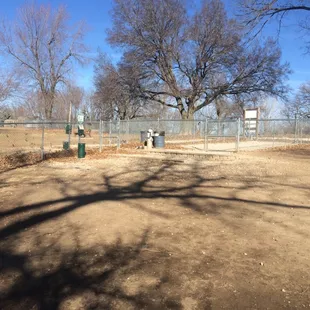 Water is turned off in the winter but there are pet waste bags here.