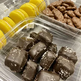 Tasty treats!  Dark chocolate, salted caramels, lemon macarons and chocolate covered banana chips!