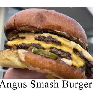 Angus Beef (2) Pattie&apos;s double cheese, Raw onion, pickles mustard &amp; Ketchup on Kaiser Roll.