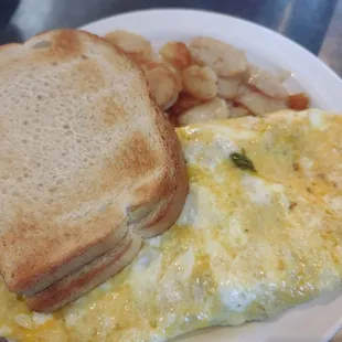 Three egg everything omelette with American fries and sourdough toast