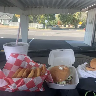 Hamburger, onion rings and a coke