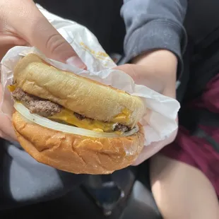 Single cheeseburger with onion