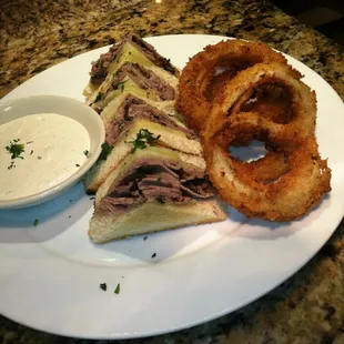 Shaved roast beef and havarti grilled cheese sandwich with horseradish dipping sauce and onion rings. #wagongrill