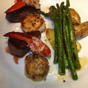 Fat Tuesday Feast. Filet Mignon, Lobster Claws and Scallops with Grilled Asparagus and Fingerling Potatoes. #wagongrill