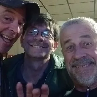 a group of men posing for a picture