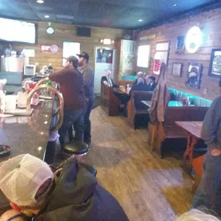 people sitting at the bar