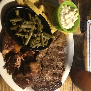 Weekend special, steak, green beans, fries, ribs, and macaroni salad.