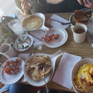 a table full of breakfast foods