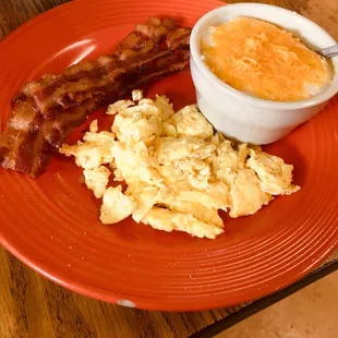 2 egg breakfast with grits (I asked for cheese); bacon; &amp; biscuits &amp; gravy! Every item was perfecto. $6.00.