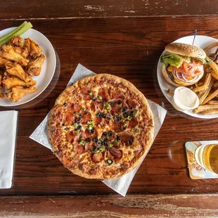 a pizza, fries, and beer