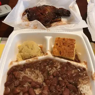 BBQ pork chop and red beans plate.