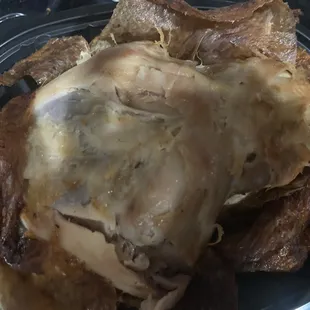 a plate of meat and chips