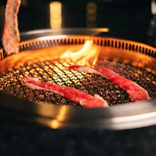 a close up of a wagyu grill