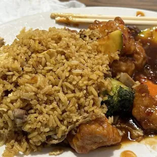Orange chicken fried rice and an egg roll. Combination plate. There was more orange chicken under the rice.