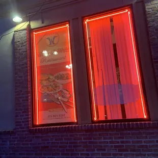 ows a restaurant with neon lights