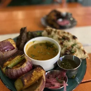 Skewer Combo Plate (grilled paneer and lamp chop with curry sauce, rice and naan)