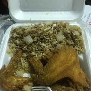 chicken and rice in a styrofoam container