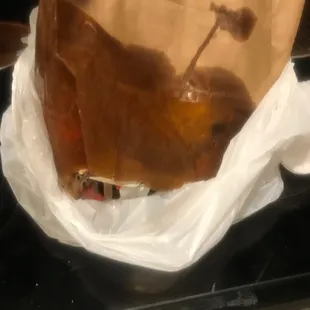 Bottom of the bag from poor packaging and they have a nerve to be rude