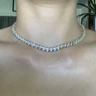 Two tennis bracelet, custom necklace.