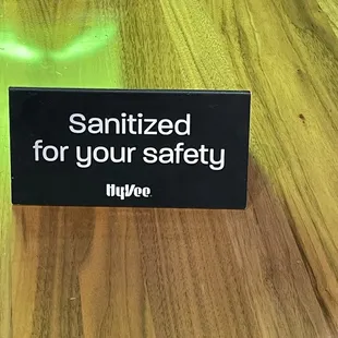 Love the ketchup on the table next to the Sanitized for your safety sign :