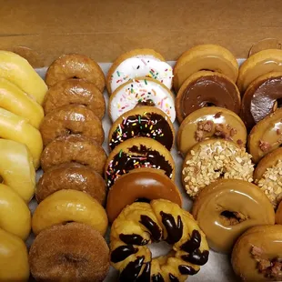 a variety of doughnuts in a box