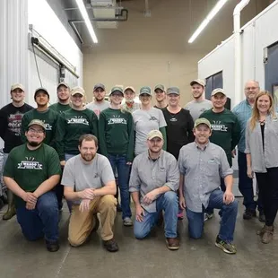 a group of people posing for a picture